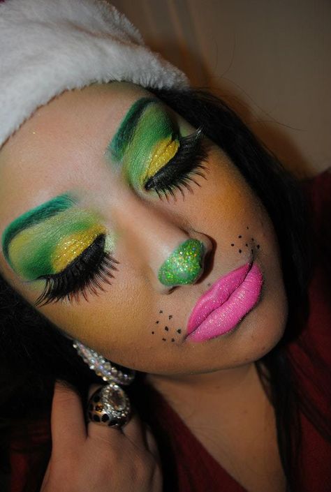 mrs grinch! tutorial  http://youtu.be/rWfumVZBCbI . . Awww Im so doing this I LOOOVE THE GRINCH.. Grinch Day At School Outfit Girl, Grinch Makeup Easy, Grinch Make Up Easy, Grinch Makeup Eyeshadow, Grinch Makeup Kids, Grinch Halloween Makeup, Grinch Eye Makeup, Grinch Hair, Mrs Grinch