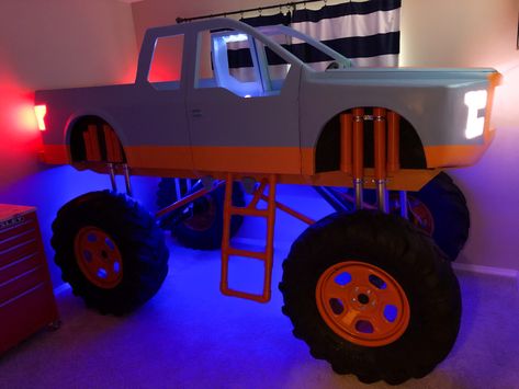 The monster truck bed that I made for my son has lots of built in lights and sound effects. Monster Truck Room Decor, Monster Truck Bedroom, Monster Truck Bed, Disney Kids Rooms, Monster Truck Room, Truck Bed Lights, Truck Bedroom, Blaze Birthday Party, Gaming Bed