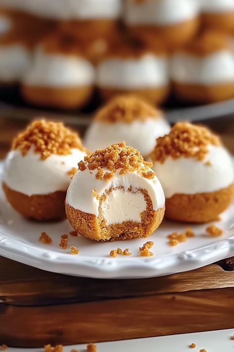 Indulge in the perfect fall treat with these No-Bake Pumpkin Cheesecake Balls! Creamy, spiced pumpkin meets tangy cheesecake in bite-sized delights that are easy to make and even easier to devour. The ultimate no-bake dessert for pumpkin lovers!

#PumpkinCheesecakeBalls #NoBakeDesserts #FallTreats #PumpkinSpice #EasyDessertRecipes #PumpkinLovers #CheesecakeBites Thanksgiving Cake Balls, No Bake Pumpkin Cheesecake Balls, Pumpkin Pie Cheesecake Bites, No Bake Pumpkin Pie Cheesecake, Pumpkin Cheesecake Balls, Thanksgiving Desserts Pumpkin, Pumpkin Balls, Cheesecake Balls, Cream Cheese Ball