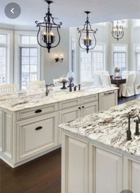 Cream Colored Kitchen Cabinets Granite, Counter Tops For White Kitchen Cabinets, Cream Cabinets White Countertop, Bronze Fixtures Kitchen, Creamy White Kitchen Cabinets, Cream Cabinets Kitchen, Oil Rubbed Bronze Lighting, Oil Rubbed Bronze Kitchen, Dark Counters