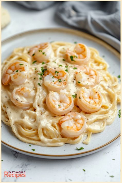 Shrimp Alfredo is a quick and easy dish with shrimp and a creamy garlic Parmesan sauce. Perfect for a weeknight dinner or a special occasion. Shrimp Alfredo Recipes Easy, Creamy Shrimp Pasta Recipes, Creamy Garlic Parmesan Shrimp, Shrimp Linguine Alfredo, Easy Shrimp Alfredo Recipe, Creamy Shrimp Alfredo, Vegetarian Alfredo, Easy Shrimp Alfredo, Shrimp Pasta Recipes Easy