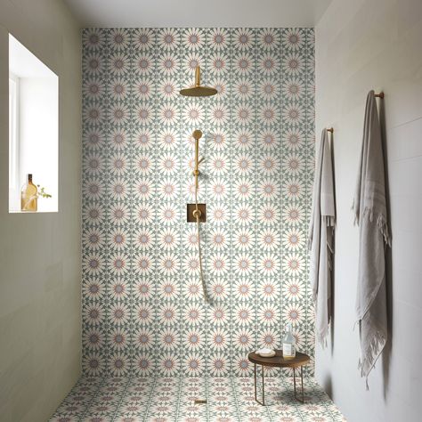 Give your home a healthy dose of vitamin D with our stunning Tropez patterned tiles. Design-led and distinctive, the starburst motif and beautiful colouring will help you style an interior that always feels on-trend. Fresh Design Why settle for less when you can dress up your home with these stunning tiles? Their geometric pattern and striking tones always create an eye-catching feature, wherever you choose to lay them. An Enduring Classic Made from durable porcelain, you can use these tiles thr Bathroom Tiles Pattern Ideas, Patterned Tiles Shower Wall, Bathroom Tile Wall And Floor, Feature Tile Shower Wall, Small Moroccan Bathroom, Bathroom Patterned Tiles, Daisy Tiles Bathroom, Two Tone Bathroom Tiles, Patterned Garden Tiles