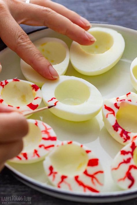 Deviled Eggs Halloween Appetizers, Halloween Devil Eggs Ideas, Halloween Organ Food, Eye Ball Halloween Food, Anatomy Themed Snacks, Deviled Eggs Eyeballs, Eye Ball Deviled Eggs, Spooky Halloween Deviled Eggs, Halloween Boiled Eggs