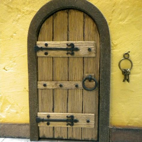 Browse unique items from FirecraftMiniatures on Etsy, a global marketplace of handmade, vintage and creative goods. Miniature Doors, Medieval Cottage, Medieval Door, Warhammer Quest, Castle Doors, Fairy Garden Doors, Medieval Decor, Old Wooden Doors, Fairy Castle