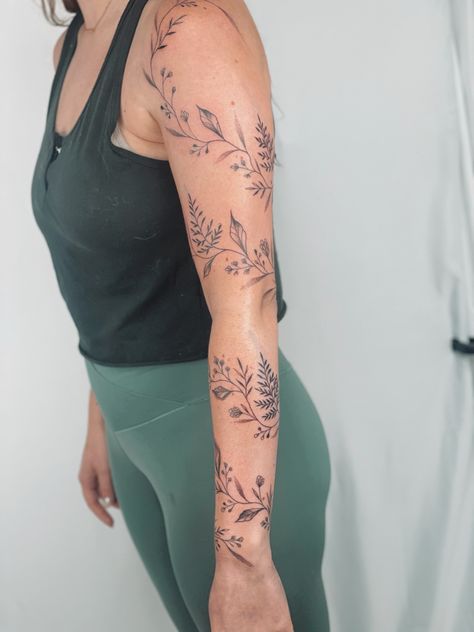 Floral Vine Half Sleeve Tattoo, Vine Upper Arm Tattoos For Women, Women Tattoos Arm Sleeve, Full Sleeve Vine Tattoo, Vine Wrapped Around Arm Tattoo Sleeve, Vine Wrap Sleeve Tattoo, Dainty Tattoo Arm Sleeve, Half Sleeve Vine Tattoos For Women, Vine With Flowers Tattoo Sleeve