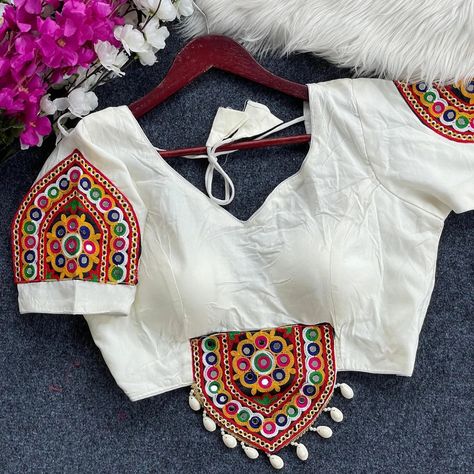 Price__550 free shipping *TRADITIONAL NAVRATRI SPL. HALTER NECK BLOUSE* *Fancy Design With Kaudi Lace* *Heavy Embroidery+Hand Mirror Work Blouse* *FABRIC*:--Heavy Magic Cotton *SIZE*:-* Size 38” Ready ulter upto 42 Inch.* *SLEEVES*:- * elbow *DESGINE*:- Beautiful Traditional Blouse Heavy Stitching Heavy Padded With Beautiful Mirror Work BACK open Style #blouse #blousecantik #blousemurah #designerblouse #blousewanita #trending #blouses #blousedesign #blouselove #blouseideas ... Halter Neck Blouse Design, Halter Neck Blouse, Lace Blouse Design, Halter Neck Blouses, Mirror Work Blouse, Beautiful Mirror, Fancy Design, Embroidery Hand, Heavy Embroidery