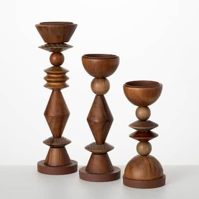 Step back in time with this Sullivans-exclusive candleholder set. Featuring warm tones and unique retro shapes, this metal and wood candleholder set is a great way to showcase your decorating skills. For over 55 years, Sullivans has been an industry leader in home decorations. Our brand is rooted in tradition while incorporating modernized trends to keep your home looking up to date with timeless style. Sullivans has acquired multiple industry leading brands that have given our customers a one-stop-shop for home decor. From every day and seasonal home decor to real and LED candles, exclusive wall art canvas prints and beautiful wind chimes, you can find just about anything and everything. Color: Brown. Gold Pillar Candle Holders, Gold Pillar Candles, Globe Candle Holder, Wooden Candle Stand, Wood Pillar Candle Holders, Wooden Candlesticks, Retro Shapes, Wood Candle Holder, Small Lanterns