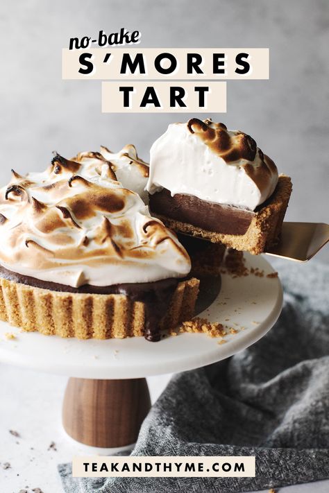 This no-bake s'mores tart is crazy rich and decadent with its graham crust, dark chocolate ganache filling, and toasted marshmallow meringue. #smorestart #smorespie #smores | teakandthyme.com S’mores Inspired Desserts, S’more Tart, Mousse Tart Recipes, Crazy Baking Ideas, S’mores Tart, Graham Crust Desserts, No Bake Tart Recipes, Fancy Pastry Recipes, Smores Tart Recipe