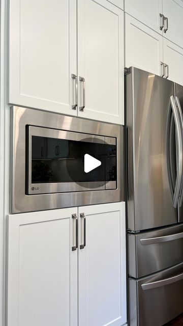 114K views · 2.6K likes | Ryan Walker on Instagram: "Would YOU buy this to save 💰  Instead of buying a built-in microwave that can cost at least $1,000- I bought a regular countertop microwave that had a trim kit available to make it look just like a built in!   It did take a little finesse to install, but once in I think it does a pretty good job 👊  Exact trim kit linked in bio!   What do you think?   #microwave #microwaves #kitchenappliances #kitchenappliance #kitchenideas #savemoney #kitchenmusthaves #kitchenupgrade" Diy Built In Microwave Cabinet, Microwave By Refrigerator, Adding Microwave To Cabinet, Drop Down Door Microwave, In Built Microwave, Built In Microwave Next To Fridge, Microwave Placement In Kitchen Ideas Upper Cabinets, Wall Mount Microwave Ideas, Kitchen With Built In Microwave