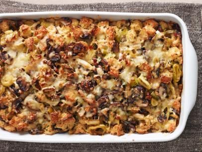 Mushroom and Leek Bread Pudding Recipe | Ina Garten | Food Network Mushroom And Leek Bread Pudding, Leek Bread Pudding, Leek Bread, Mushroom Bread Pudding, Thanksgiving Vegetables Side Dishes, Thanksgiving Vegetable Sides, Carrot Casserole, Mushroom Leek, Savory Bread Puddings