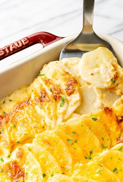 These are the best easy cheesy scalloped potatoes (potato gratin). They're simple to make and perfect for a holiday side dish or to make any occasion special. The whole family will love these creamy sliced potatoes. Cheddar and parmesan cheeses bake up to perfection for the best side dish ever! Betty Crocker Scalloped Potatoes, Easy Cheesy Scalloped Potatoes Recipe, Easy Cheesy Scalloped Potatoes, Cheesy Scalloped Potatoes Recipe, Easy Scalloped Potatoes Recipe, Scalloped Potatoes Easy, Scalloped Potato, Cheesy Scalloped Potatoes, Scalloped Potatoes Recipe