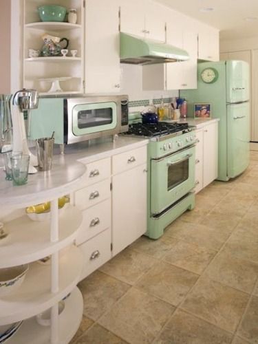 The rounded cabinet ends and countertop add a nice whimsy and opportunities for displays. Green Appliances, Cocina Shabby Chic, Casa Retro, Vintage Style Kitchen, Decor Ikea, Kitchen Paint Colors, Casa Vintage, Design Seeds, Kitchen Color