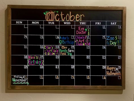 This is a chalkboard calander purchased from Hobby Lobby and decorated for the month of October using Loddie Doddie chalk markers. October Chalk Calendar Ideas, August Calendar 2023 Chalkboard, September Chalk Calendar, August Calendar 2024 Chalkboard, January Chalk Calendar, October Dry Erase Calendar Ideas, October Chalkboard Art Calendar, Monthly Chalkboard Ideas, September White Board Calendar Ideas