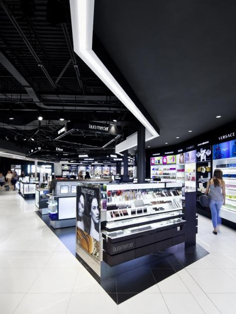 Redevelopment of the International Commercial Sector and Duty Free Shop at the Montreal-Trudeau Airport - Jodoin Lamarre Pratte architectes inc. Duty Free Store, Shopping Mall Interior, Duty Free Shop, Base Building, Pharmacy Design, Organization And Management, Building Architecture, Showroom Design, Cosmetic Shop