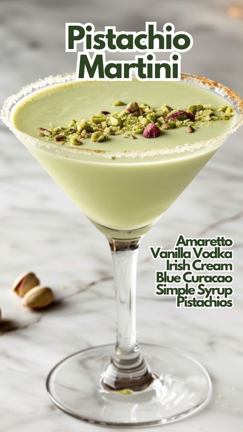 The Pistachio Martini is a luxurious and creamy cocktail that perfectly balances the flavors of vanilla, almond, and Irish cream with a hint of citrus from blue curacao. The crushed pistachio rim adds a delightful crunch and a nutty finish, making this cocktail a memorable treat for any occasion.  #pistachiomartini via @mybartender Vanilla Vodka Martini Recipes, Pistachio Cocktail, Dessert Martinis, Pistachio Martini Recipe, Martini Variations, Amaretto Cocktails, Colourful Cocktails, Baileys Cocktails, Holiday Martinis