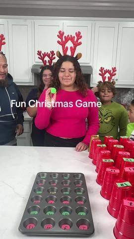 Super Fun Holiday Game 🧑‍🎄 Dad and family bounce ping pong balls int... | christmas games ideas 2023 | TikTok Christmas Muffin Tin Game, Christmas Pong Party Games, Ping Pong Ball Christmas Game, Ping Pong Games For Kids, Ping Pong Ball Muffin Tin Game, Ping Pong Ball Games For Kids, Christmas Pong Game, Family Prize Games, Christmas Punch Board Game