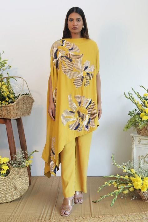 Buy #mustard one shoulder #tunic with abstract embroidery & asymmetric silhouette. Paired with pant by #Nayantaara at #AzaFashions Shop online now at #Azafashions.com Call +91 8291990059 or email contactus@azafashions.com for enquiries. #wedding #festive #ethnic #tradional #shopping #shoponline #party #reception #bride Co Ords Outfits, Reception Bride, Party Reception, Kaftan Designs, Abstract Embroidery, Drape Gowns, Yellow Abstract, Stylish Dress Designs, Indian Fashion Dresses