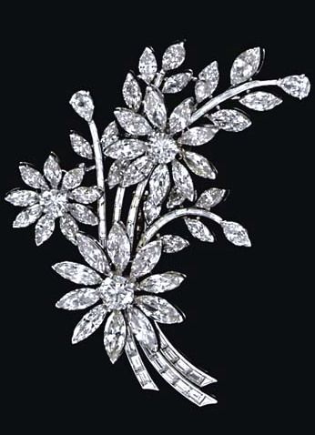 A DIAMOND FLOWER BROOCH  Designed as three circular and marquise-cut diamond flowerheads, set en tremblant, extending marquise-cut diamond leaves, to the baguette-cut diamond stem, mounted in platinum Diamond Flower Brooch, Bijoux Art Deco, Vintage Wedding Jewelry, Wedding Brooch, Rings Silver, Circle Diamond, Diamond Brooch, Jewellery Handmade, Gemstone Jewellery