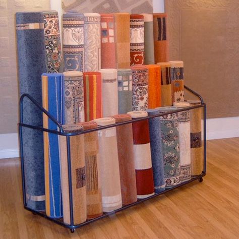 How To Display Rugs In Store, Rug Display Ideas Retail, Carpet Store Design, Unit Renovation, Rug Display, Small Shop Interior, Fabric Shop Display, Rugs Display, Prop Storage