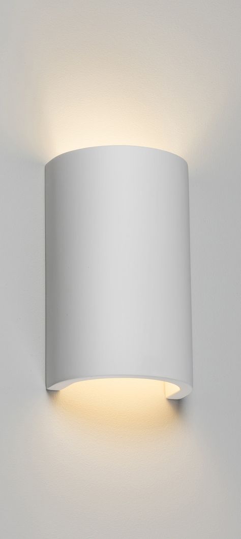 This simple yet elegant curved up and down plaster wall light, helps to create a soft, discreet feature. The white finish, although great on its own, can be painted using a good quality emulsion paint, enabling it to blend into the surrounding walls seamlessly. The is great as a single fitting, but can also be in a group, providing a smooth ambient lighting feature. Natural gypsum plaster construction Dimmable subject to lamp 40W max. G9 (lamp not included) HEIGHT 180 mm WIDTH 110 mm PROJECTION Elegant Home Office, Plaster Wall Lights, Hallway Wall Lights, Lighting Feature, Up Down Wall Light, Barn Kitchen, Indoor Wall Lights, Plaster Walls, Elegant Homes