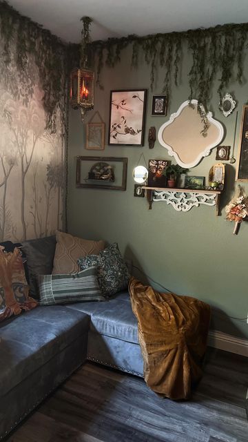 Fae Aesthetic Home, Woodland Living Room Ideas, Cottage Core Goth Living Room, Cottage Witch Living Room, Dark Fairycore Living Room, Practical Magic Living Room Aesthetic, Cottage Witch Aesthetic Living Room, Witchy Beach House, Dark Apartment Aesthetic Living Room