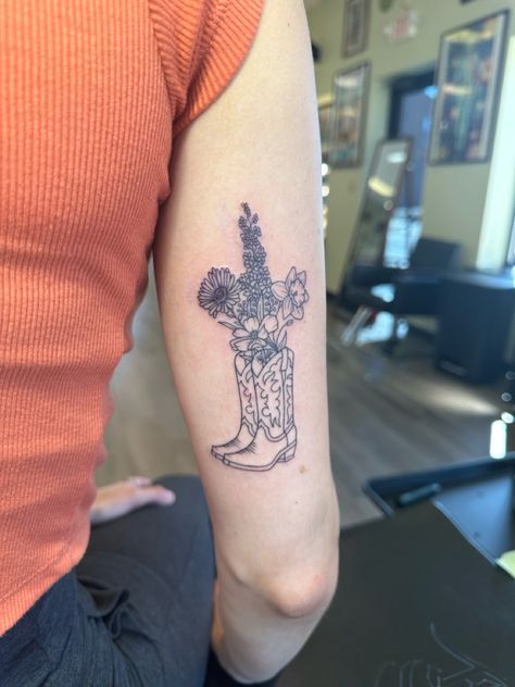 Cactus Spine Tattoo, Montana State Flower Tattoo, Cowgirl Boot Tattoo Small With Flowers, Flower Boot Tattoo, Floral Cowboy Boot Tattoo, Wyatt Flores Tattoo, Women Western Sleeve Tattoo, Cactus With Cowboy Hat Tattoo, Cowboy Boot Flowers Tattoo