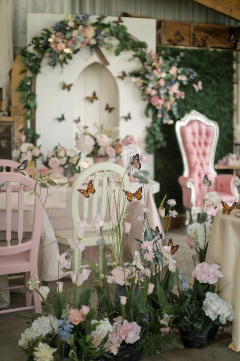 Butterfly-themed bridal shower setup with pastel chairs, pink flowers, and butterfly accents He Gives Her Butterflies Bridal, Enchanted Garden Bridal Shower Theme, Lifetime Of Butterflies Theme Bridal, He Gives Me Butterflies Shower Theme, Butterfly Wedding Shower Theme, Butterfly Bridal Shower Ideas Decoration, He Gives Me Butterflies Theme, Butterfly Theme Bridal Shower Ideas, Bridal Shower Butterfly Theme