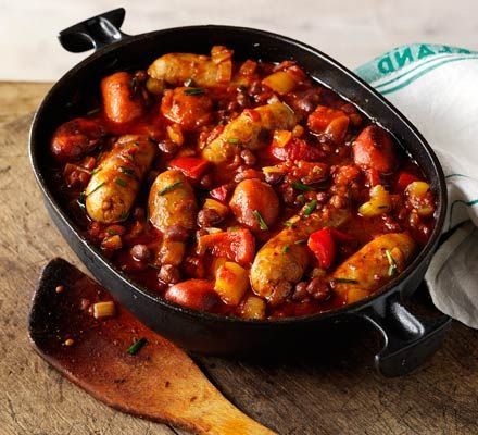 A comforting and hearty one-pot sausage stew with chorizo, smoked paprika and plenty of vegetables Easy Sausage Casserole, Sausage And Bean Casserole, Sausage Casserole Recipes, Chilli Recipe, Sausage Stew, Sausage Dishes, Sausage Casserole, Bean Casserole, Kielbasa