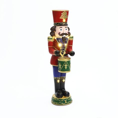 Get ready to elevate the magic of the holiday season with our stunning Christmas-theme ornament. This exquisite decoration is meticulously designed to bring vibrant colors into your indoor winter holiday decor. Enjoy the enchantment of our Nutcracker Drummer, Soldier, and King series, crafted to help you create a wondrous holiday showcase that will capture everyone's imagination. The Nutcracker embodies themes of bravery, kindness, friendship, and family warmth, making it a timeless symbol of th Nutcracker Drummer, Traditional Nutcracker, Ceiling Fan Shades, Nutcracker Figures, Nutcracker Ornaments, Kids Vanity, Timeless Symbol, Kids Headboard, Battery Operated Lights