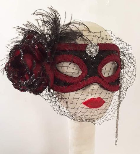 Red Black Masquerade Mask, Ballroom, Steampunk Mask, Handmade, Costume, Accessory Steampunk red and black masquerade mask. This handmade one of a kind mask is made from a paper mache base. Mask has been covered with faux leather look black fabric which is then embellished with black glitter for shimmer. Mask is edged with red gimp around the edges and eyelets. I have applied a large red rose flower which is embellished with black glitter to right side of mask, tucked behind mask you will find sp Masquerade Mask With Veil, Red Masquerade Outfit, Rose Masquerade Mask, Red And Black Masquerade Mask, Maskerade Mask, Red Masquerade Mask, White Masquerade Mask, Crystal Mask, Black Masquerade