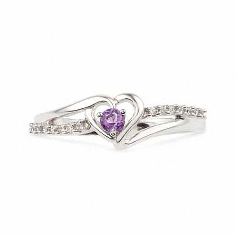 Pledge to love her for a lifetime with this exquisite promise ring. Fashioned in cool sterling silver, this ring features a delicate open heart at its center, punctuated with a single, glistening purple amethyst. A ribbon of shimmering diamond accents sweeps across the style, adding brilliant sparkle. Buffed to a brilliant shine, this ring is certain to take her breath away. Custom made to fit her ring size. Sterling silver rings cannot be resized after purchase. Purple And Silver Jewelry, Promise Rings Purple, Promise Rings Pink, Infinity Promise Rings, Aesthetic Promise Rings, Amethyst Wedding Ring, Cute Promise Rings, Promise Rings Simple, Heart Promise Rings