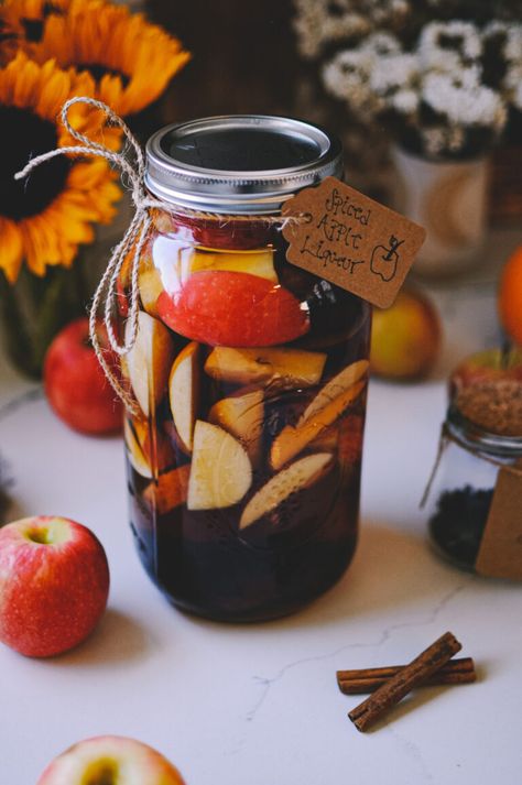 How to Make Apple Spiced Liqueur | Herbal Academy | This homemade apple spiced liqueur recipe gives your taste buds a welcome dose of sweet and spice, with a little bit of heat. Herbal Alchemy, Brown Sugar Simple Syrup, Festive Holiday Drinks, Herbal Academy, Spiced Drinks, Homemade Liquor, Thanksgiving Drinks, Medicinal Garden, Liqueurs Recipes