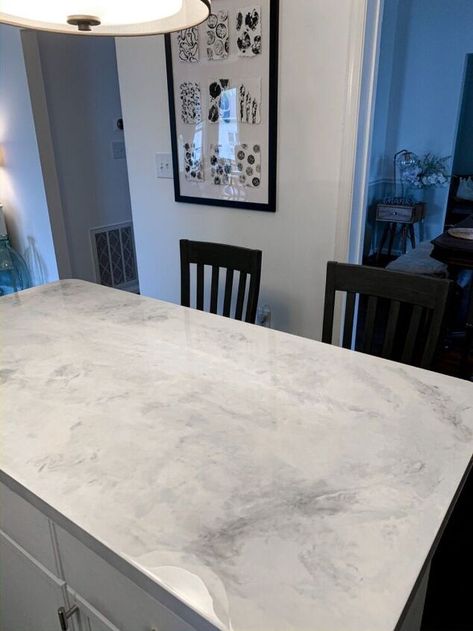 There’s tons of info out there on countertop epoxy, but when I decided this was something I wanted to do in our kitchen as a much more cost effective alternative to real stone, I struggled to find an exact tutorial for the subtle marble look we wanted as many tutorials are bright colors or had a lot going on, so I hope this helps someone else looking for the same thing!We we’re looking at a cost of almost $3000 to replace our counters with marble but this isn’t our forever home so I to… Epoxy Countertop Colors, Epoxy Countertop Kitchens, Faux Countertops, Diy Epoxy Countertop, Marble Epoxy Countertop, Epoxy Counters, Renovating Furniture, Countertops Epoxy, Butcher Block Countertops Kitchen