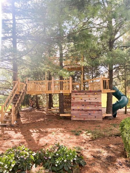 A three-story treehouse made by a DIY dad for three crazy boys! Diy Treehouse Playset, Treehouse With Zipline, Wooded Backyard Playground, Diy Yard Playground, Diy Treehouse Swingset, Multi Level Treehouse, Treehouse Playground Ideas, Treehouse With Deck, Diy Wood Playground