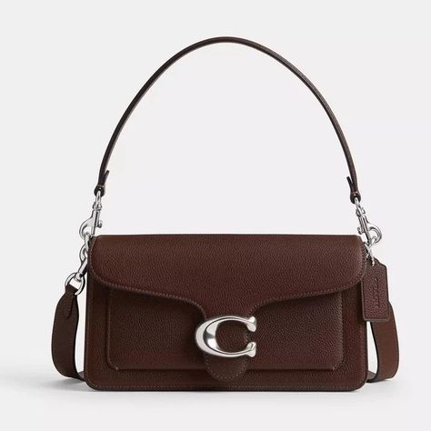 Luxury Bags Estimated Price Range: $290-$390. We'll confirm the exact price at the time of your query due to market fluctuations. #coach #coachbag #coachtabbybag #luxurybags #bag #bagsforsale Coach Tabby 26, Coach Tabby Shoulder Bag, Tabby Shoulder Bag, Coach Tabby, Hand Style, Structured Design, Compact Bag, Polished Pebble, Large Wallet