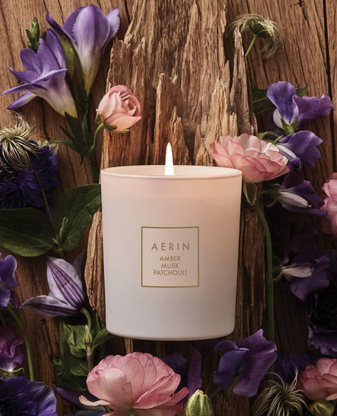 AERIN’s newest vanity essential. Illuminate your home with a fragrance that evokes the ease of a comforting moment. Tap to discover the new Amber Musk Patchouli scented candle.​ Patchouli Scent, Amber Musk, Candle Glow, Golden Glow, Estée Lauder, Glass Vessel, Scented Candle, Home Fragrance, The Golden