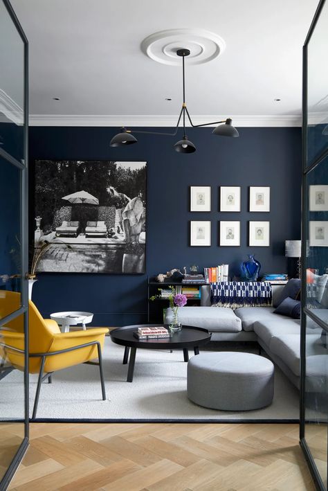 Navy living room ideas - 10 ways to pull off this color | Livingetc Decor Living Room Table, Moody Home, Moody Home Decor, Navy Living, Navy Living Rooms, Navy Blue Living Room, Blue Lounge, Navy Walls, Navy Blue Walls