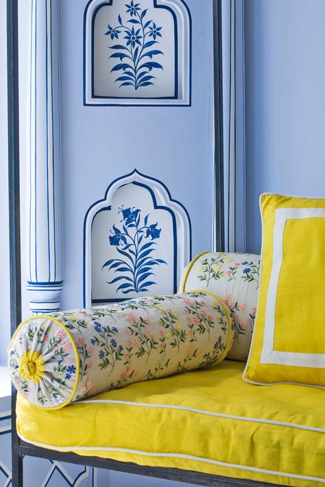 A daybed is upholstered in a bright lemon yellow, which accents the beautiful powder blue walls in Mumbai, India's Gem Palace jewelry store. India Mahdavi Interior Design, Jaipur Wall Art, Powder Blue Walls, Jaipur Furniture, Rajasthani Interior Design, Blue Wall Design, Mumbai Photos, Jaipur Design, Bar Palladio