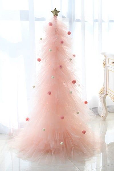 Where to Buy Pink Tulle Christmas Trees How To Make Tulle Christmas Trees, Pink Tulle Christmas Tree, Pink Tabletop Christmas Tree, Black And Pink Christmas Tree Ideas, Pink Christmas Crafts Diy, Pink Decor Christmas Tree, Diy Pink Christmas Decor, Tulle Christmas Trees Diy, Pink Christmas Crafts