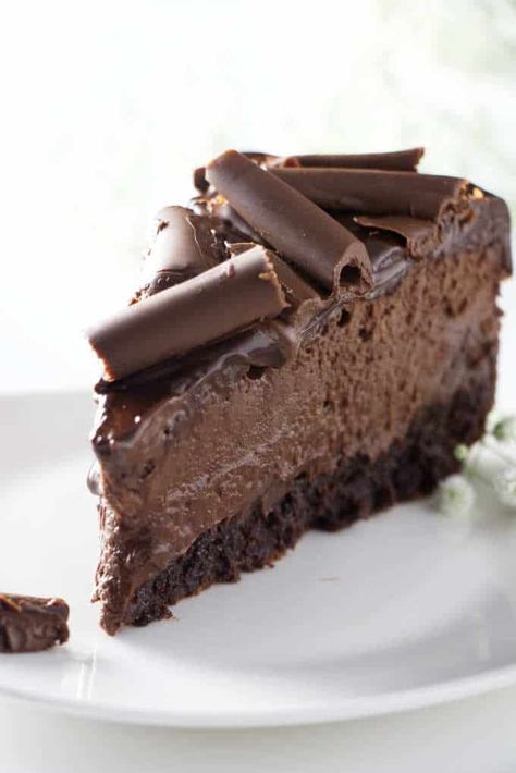 Triple Chocolate Brownie Cheesecake Award Winning Chocolate Desserts, Brownie Chocolate Cheesecake, Brownie Bottom Chocolate Cheesecake, Chocolate Cherry Cheesecake Recipe, Triple Chocolate Cheesecake Recipe, Brownie Crust Cheesecake, Brownie Bottom Cheesecake Recipes, Chocolate Cheesecake Crust, Dark Chocolate Cheesecake Recipes