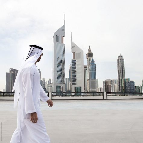 Businessman wearing traditional dress. Business district, Dubai. U.A.E by Hugh Sitton - Stocksy United #stockphoto #stock #diversity #business Corporate Sponsorship, Dubai Photoshoot, Dubai Business, Dubai Aesthetic, Business Setup, Dress Business, Business District, Business Technology, Traditional Dress