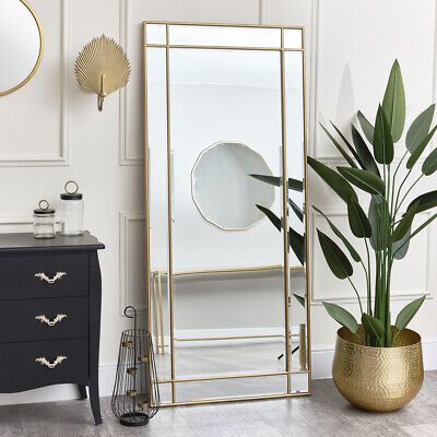 https://mirrorselect.com/          This Large Gold Framed Art Deco Wall / Leaner Mirror is a striking full length mirror, perfect for lovers of gold decor and metallic finishes. Made of wood, metal and glass, this mirror has a large rectangular shape and comes with an antique gold cross over metal frame and bevelled glass.    A lovely mirror choice for placement in a bedroom, hallway, living room or bathroom space. This mirror could easily blend into vintage, art deco or contemporary style… Large Art Deco Wall Mirror, Large Mirror In Hallway, Master Room Decor Ideas Modern, Large Gold Mirror Living Room, Large Mirror In Dining Room, Mirror At End Of Hallway, Floor Length Mirror Bedroom, Large Mirror In Bedroom, Gold Mirror Living Room