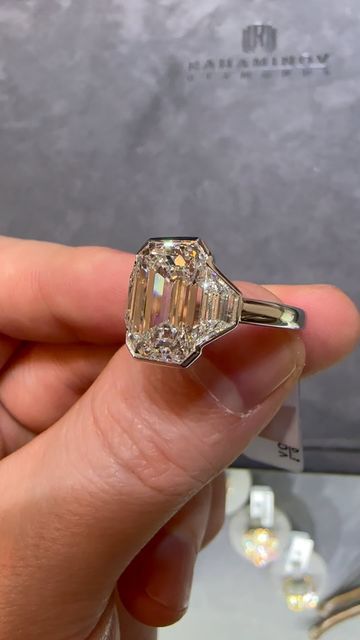 Grant Mobley on Instagram: "The delicate bezel on this ring by @rahaminovdiamonds and the seamless joining of the side stones to the center emerald cut diamond are perfection. 😍😍 . #diamondring #emeraldcutdiamond #3stonering #engagementring #engagement #weddingring" Ascher Cut Diamond Engagement Ring Bezel, Platinum Bezel Set Diamond Ring, Emerald Diamond Ring Engagement, Cushion Bezel Engagement Ring, Ascher Cut Diamond Engagement Ring, Crisscut Diamond, Bezel Set Diamond Ring, Big Engagement Rings, Bezel Engagement Ring