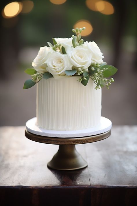 One Tier Wedding Cake Ideas: Chic and Simple Designs for Your Special Day - OMG Hitched Wedding Cake 3 Separate Tiers, Simple White 2 Tier Wedding Cake, Wedding Cake For Two, Bridal Cake Table Decorations, Simple Traditional Wedding Cake, One Tier Wedding Cake With Flowers, One Teir Wedding Cake, Wedding Cake One Layer, White Simple Wedding Cake