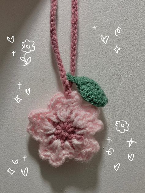 Adorable little Sakura/cherry blossom charm, perfect to glamourise your bag or act as a headphone wrap 🌷🌸 the loop may be adjusted accordingly and it is approximately 16cm in length. Made To Order Please keep in mind that delivery times are an estimate and if you have any further enquiries please do not hesitate to message me!  I also take other colour requests 🍓 Crochet Sakura Keychain, Handmade Gifts Tutorial, Sakura Crochet Pattern, Crochet Headphones Accessories, Crochet Pink Ideas, Crochet Headphone Charm, Bag Charms Crochet, Crochet Headphone Accessories, Pink Crochet Ideas