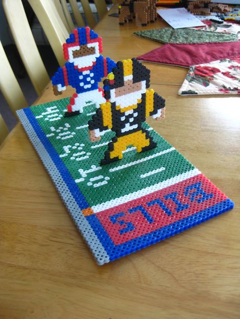 Perler bead Buffalo Bills Field and Players by Slimer530 on deviantart Ikea Pyssla, Christmas Perler Beads, Plastic Canvas Books, Melty Bead Patterns, Perler Crafts, Hama Bead, Beads Designs, Beads Ideas, Aqua Beads