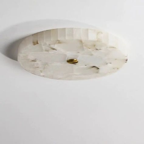 Lighten any room with this warm, stylish Round Alabaster Flush Mount Ceiling Lamps. Crafted from pure alabaster and designed to fit in any room, this lamp is perfect for adding atmosphere and elegance. Dimensions： 15.75" D x 1.97" H(40cm D x 5cm H) 19.68" D x 1.97" H(50cm D x 5cm H) 23.62" D x 1.97" H(60cm D x 5cm H) Specification： Material: Metal, Natural Alabaster from Spain Finish: Brass (Optional: Black, White, Bronze, Nickel, Chrome, Silver) Voltage: AC110V-220V Light Source: LED Lamp Light Alabaster Flush Mount, Marble Flush Mount Light, Round Flush Mount Ceiling Light, Organic Flush Mount Light, Marble Ceiling Light, Lamps For Low Ceilings, Alabaster Flush Mount Light, Crystal Flush Mount Light, Alabaster Ceiling Light