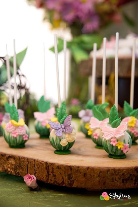 Tinkerbell birthday party | CatchMyParty.com Fairy Cake Pops, Tinkerbell Party Theme, Enchanted Forest Birthday Party, Enchanted Forest Baby Shower, Woodland Fairy Birthday, Enchanted Forest Birthday, Fairy Birthday Cake, Tinkerbell Cake, Forest Birthday Party