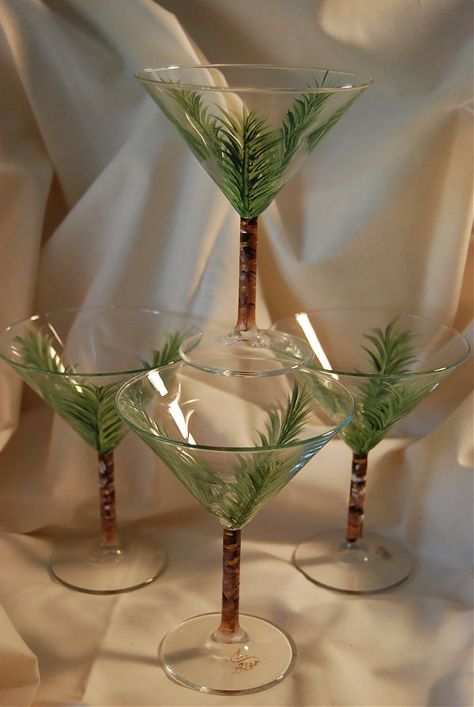 Hand painted martini palm tree glasses Painting On Martini Glasses, Diy Martini Glasses, Painted Martini Glasses Ideas, Green Wall Decor Ideas, Painted Martini Glasses, Martini Painting, Greenery Wall Decor, Beverage Glasses, Wine Glass Decor