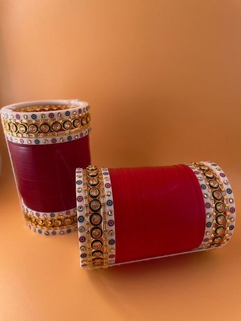 Available in sizes 2.4, 2.6, and 2.8. All of our chura sets come in a gold box and have never been worn or tried on. Free Shipping #churi #indian #bangladesh #usa #bangle #traditional Traditional Chooda Punjabi Bride, Red Choora Designs, Dark Red Choora, Kaleere Punjabi Traditional, Chooda Designs Punjabi, Chura Designs Bridal, Chura Bridal Punjabi Bride, Chooda Designs Brides, Choora Designs